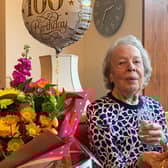 Adelaide 'Addie' Furnivall with her card from the Queen