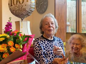 Adelaide 'Addie' Furnivall with her card from the Queen