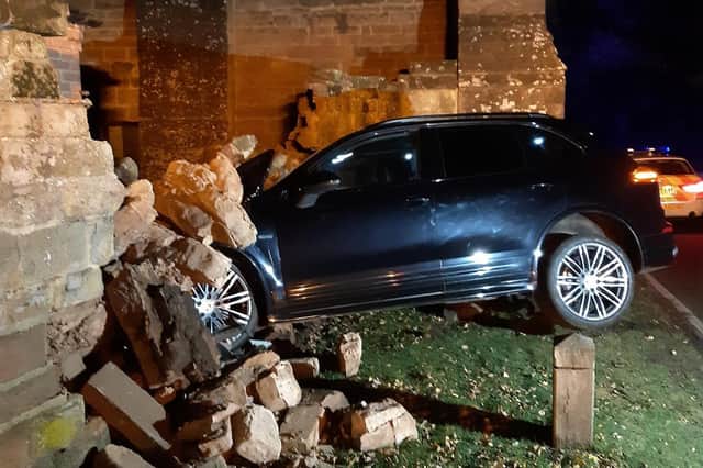 The driver of this Porshe Cayenne escaped uninjured after over shooting a give way junction and hitting a wall at Stoneleigh tonight (Saturday).