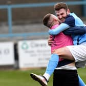 James Hancocks celebrates scoring the winner from a free kick