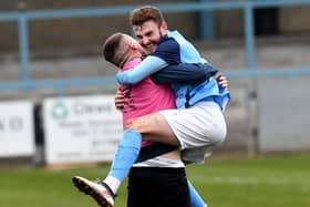 James Hancocks celebrates scoring the winner from a free kick