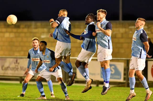 The Rugby wall repels a late free kick against Hinckley LR in the FA Vase