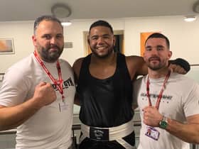 Cleary’s heavyweight Joe Bourne (centre) with coaches Johnny Biddle, and Tom Kelly at Saturday evening’s home show