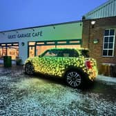Nicholas ’Nico’ Martin and his festive MINI Electric car made a stop at Gilks' Garage Cafe for its Christmas market on Sunday November 28 (Submitted photo)