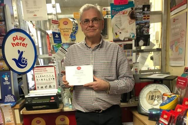 Chris with his award.