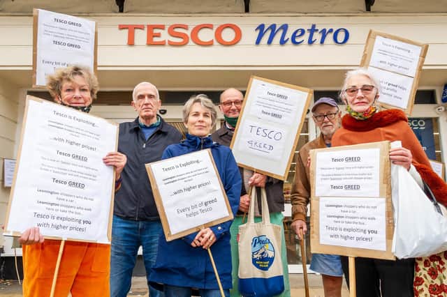 Campaigners protest outside the Tesco branch in The Parade, Leamington. They are fighting against price rises at the store since it was rebranded from a Metro to an Express branch in the summer