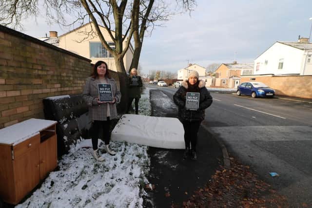 Cllr Mini Mangat (right) with officers from Warwick District Council next to fly-tipping in Gainsborough Drive. Photo supplied