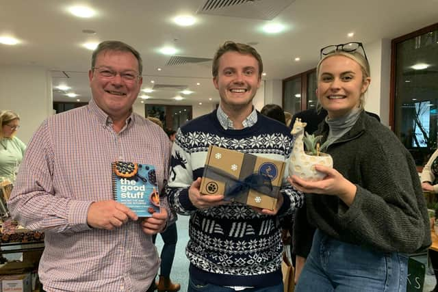 (l-r) Partner Robert Lee, Associate Nathan Hinks, and Business Development & Marketing Executive Hannah Ingram at the Christmas Market