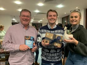 (l-r) Partner Robert Lee, Associate Nathan Hinks, and Business Development & Marketing Executive Hannah Ingram at the Christmas Market