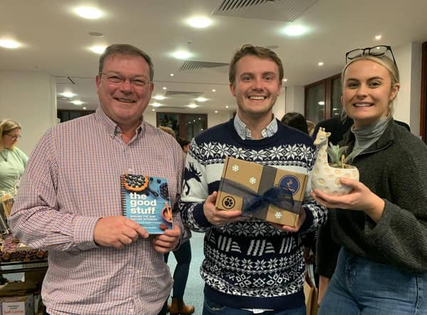 (l-r) Partner Robert Lee, Associate Nathan Hinks, and Business Development & Marketing Executive Hannah Ingram at the Christmas Market