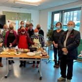 Chef Alistair Lewis with the Warm Hub slow cooking group and project partners from Compassionate Kenilworth and the Kenilworth Centre. Photo by WRCC