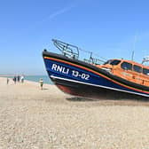 RNLI (Royal National Lifeboat Institution) Shannon class life boat 'The Morrell' drives up onto the beach in Lydd on Sea in southeast England on September 8, 2021. (Photo by JUSTIN TALLIS / AFP) (Photo by JUSTIN TALLIS/AFP via Getty Images)