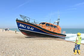 RNLI (Royal National Lifeboat Institution) Shannon class life boat 'The Morrell' drives up onto the beach in Lydd on Sea in southeast England on September 8, 2021. (Photo by JUSTIN TALLIS / AFP) (Photo by JUSTIN TALLIS/AFP via Getty Images)