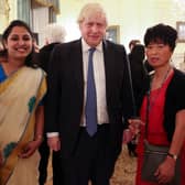 Two carers at Kineton Manor Nursing Home thanked for their Covid-19 pandemic service during meeting with Prime Minister (Pictured: Kineton carer Tintu Tom, Prime Minister Boris Johnson and Kineton Carer Kitty Chen.)