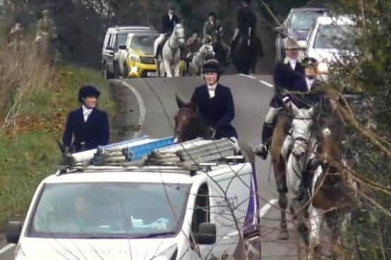 Warwickshire Hunt is accused of causing 'traffic chaos' as it rides down a hill towards Broughton