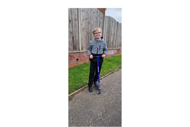 Dillan Rose, aged seven, is scooting for 90 minutes covering a minimum of 50 laps of Barford Park on December 29 to raise money for Cash for Kids.