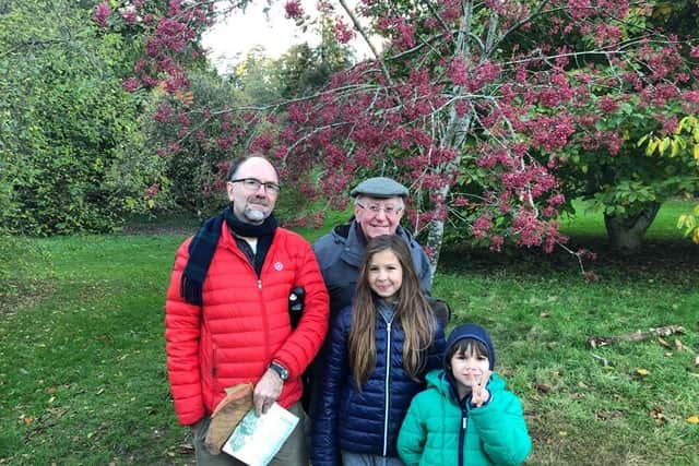 Dr Iain Smith with his eldest son Stefan and grandchildren Olivia and Kamil.