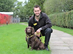 James  Sowerby is pictured at Dogs Trust Kenilworth with Spaniel Cross, Suede, one of the many dogs his fundraising efforts will help.