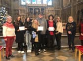 The Christmas tree awards ceremony. From left to right Carol Warren, Sophie Bevan, Ella Walker, Anna Cygal, Jack Probert, Oscar Jayes, Irene Tsiampakou, Helen Fitzpatrick and Gillian Fletcher. Photo supplied
