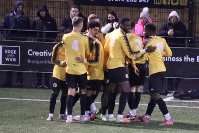 Racing Club Warwick players celebrate Costelus Lautaru scoring against Lye Town