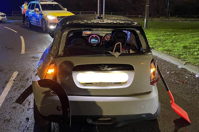 The driver of the white Mini crashed the vehicle in Princes Drive, Leamington, and provided a positive breath test. Photo by OPU Warwickshire.