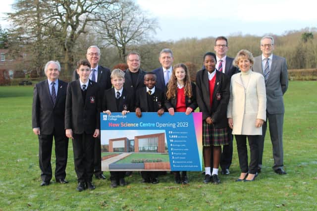 New Science Centre project group with Year 7 Science Club pupils
Back row left to right - Alex Darkes, foundation assistant head, Eddie Tolcher, foundation bursar, Nick Henderson, MD Trendgrey Construction, Anthony Pugh, AT Architects, Ed Hester, headmaster, Steve Joyce, Ainsleys & Partners
Front row left to right – Year 7 pupils Jasper Nicholls, Noah Cowlishaw, Morgan Stephen, Amy Robinson, Faith Katanda and Chair of Trustees, Liz Griffin