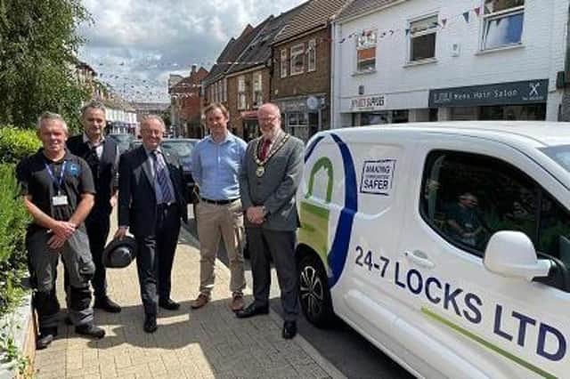 Robert Windsor and Nick Nearne of 24-7 Locks, Rupert Matthews Police and Crime Commissioner, Cllr Simon Whelband, Richard Nunn Mayor of Lutterworth and 24-7 Locks in Lutterworth.