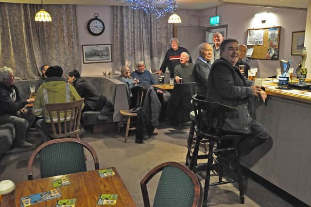 Regulars at the Queen's Head pub in Cubbington over the what was the final weekend of it being open.