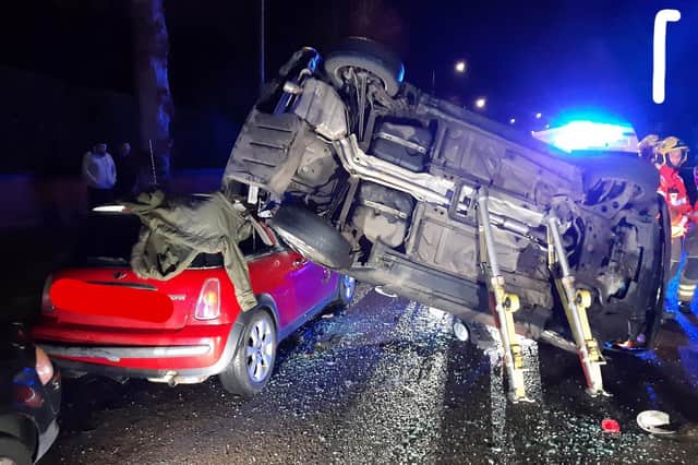 A drink driver in Rugby crashed her Mini into a a row of parked cars in Clifton Road and then hit an oncoming car before flipping the vehicle over onto its side.