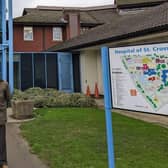 Professor Andrew Hardy, chief executive officer of University Hospitals Coventry and Warwickshire NHS Trust, and local MP Mark Pawsey outside the Hospital of St Cross