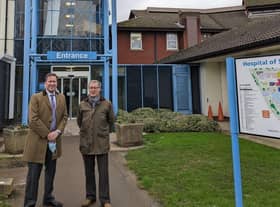 Professor Andrew Hardy, chief executive officer of University Hospitals Coventry and Warwickshire NHS Trust, and local MP Mark Pawsey outside the Hospital of St Cross