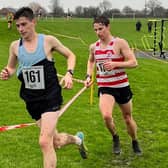 Senior men's winner Haydn Arnall on his way to victory at the Northants Cross Country Championships ahead of runner-up Fynn Batkin of Kettering