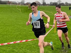 Senior men's winner Haydn Arnall on his way to victory at the Northants Cross Country Championships ahead of runner-up Fynn Batkin of Kettering