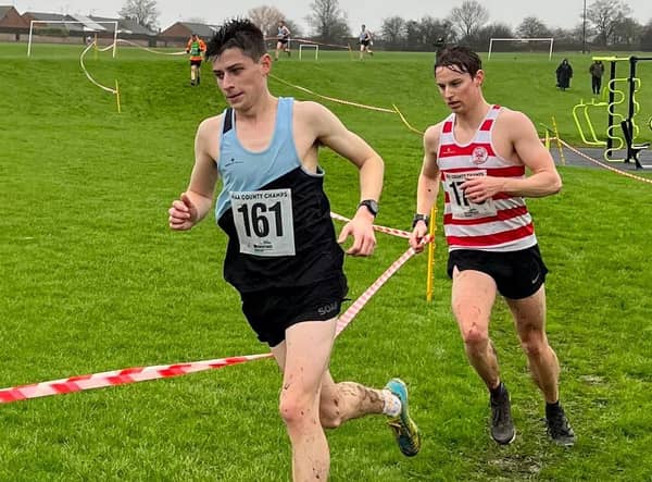 Senior men's winner Haydn Arnall on his way to victory at the Northants Cross Country Championships ahead of runner-up Fynn Batkin of Kettering