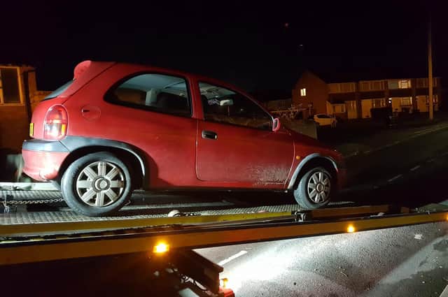 A car has been towed after the driver parked their vehicle across someone's drive in Warwick. Photo by Warwick Police.