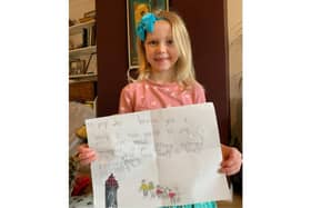 Anna Steele-Gardner with her letter to people without a home. Photo supplied