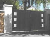 A controversial design of gates and a wall for the front of a home have been approved by councillors - even though one suggested they resembled the ‘Great Wall of Bulkington’.