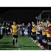 James Mace is congratulated on his record-braking 407th appearance