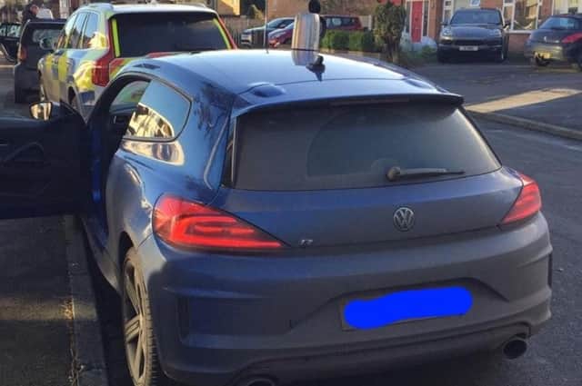 A disqualified driver who was wanted on a police warrant was stopped in Warwick.