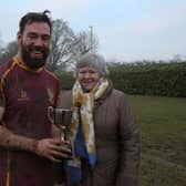 The presentation of the Brian White Cup by Brian's widow Cath White to OLs skipper Dom Hammond, captaining the side in the injury absence of Charlie Seager