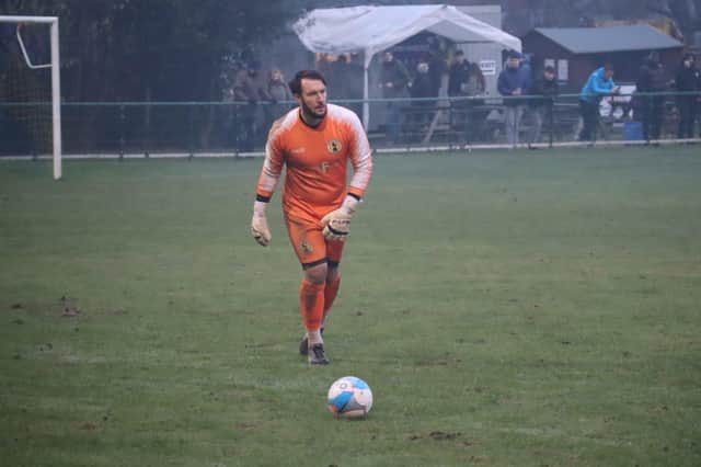 Racing Club Warwick keeper Dan Crane pulled off a fine double save to earn a point against Bewdley