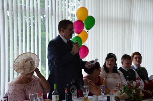 John gives a speech at Paula's wedding, a cherished family memory.