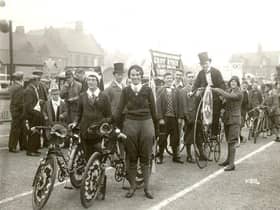 Look at these road-hogging cyclists! A cycle touring club at a procession in Rugby in the early thirties.
