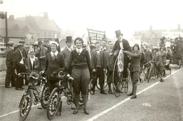 Look at these road-hogging cyclists! A cycle touring club at a procession in Rugby in the early thirties.