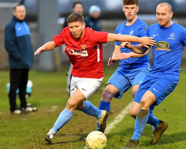 David Kolodynski in Rugby Town's league game last week with Cogenhoe, as they maintain their promotion efforts in the build-up to the FA Vase game on February 12 PICTURE BY MARTIN PULLEY