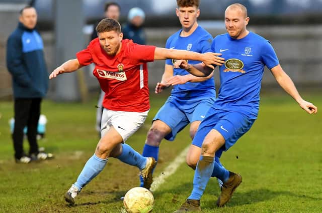 David Kolodynski in Rugby Town's league game last week with Cogenhoe, as they maintain their promotion efforts in the build-up to the FA Vase game on February 12 PICTURE BY MARTIN PULLEY