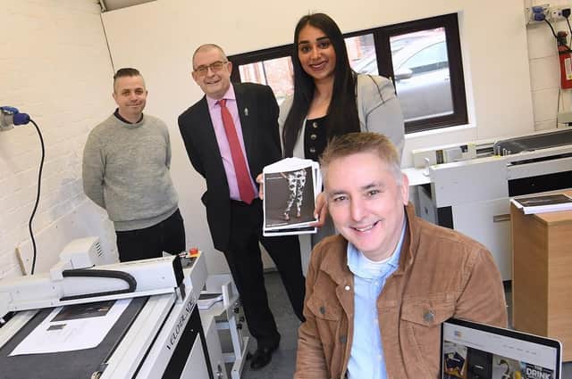Colin Jones from XPD Print (front), with from the left, Stuart Chalmers from XPD Print, Jon Bass from CWLEP Growth Hub and Kierandeep Bal from Coventry City Council