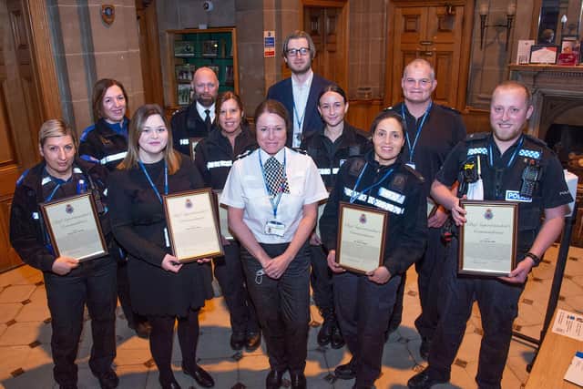 Chief Supt Emma Bastone presents commendations to the Leamington Safer Neighbourhood Team.