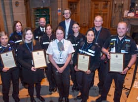 Chief Supt Emma Bastone presents commendations to the Leamington Safer Neighbourhood Team.