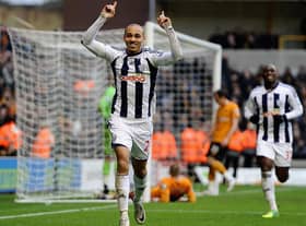 WOLVERHAMPTON, ENGLAND - FEBRUARY 12: Peter Odemwingie of West Bromwich celebrates the third goal during the Barclays Premier League match between Wolverhampton Wanderers and West Bromwich Albion at Molineux on February 12, 2012 in Wolverhampton, England. (Photo by Laurence Griffiths/Getty Images)